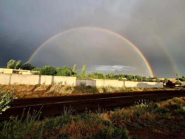 The city under the rainbow shadow thumbnail