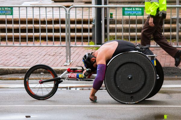 A para-athlete finally rests after completing the Boston Marathon thumbnail