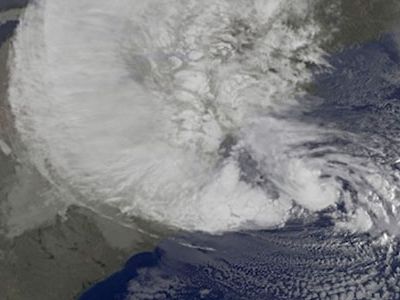 Models indicate that climate change will cause more frequent hurricanes, but the overall trend can’t be linked with a particular event, such as Hurricane Sandy (above, on October 29).