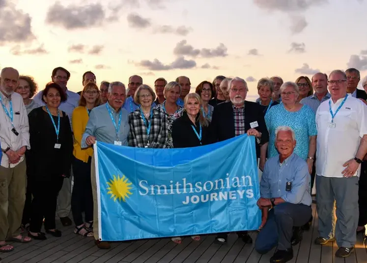Smithsonian Journeys travelers enjoying an evening sunset on the Voyage from Rome to Malta cruise