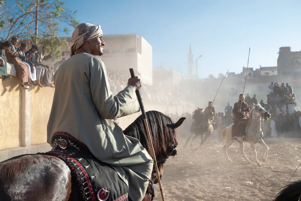 Horsemen performing at Al-Qinawi Festival, Qena, Upper Egypt.