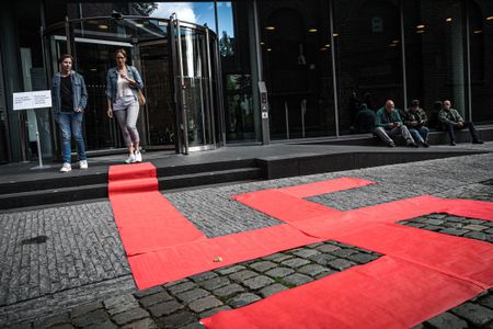 A picture taken on September 8, 2019 shows a Swastika formed with red carpets by artist Ralph Posset during the opening of an exhibition entitled "Design of the Third Reich" at the Design Museum Den Bosch, in 's-Hertogenbosch, central Netherlands. - The exhibition will show the contribution of design to the development of the Nazi ideology.
