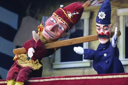 A traditional Punch and Judy puppet show.