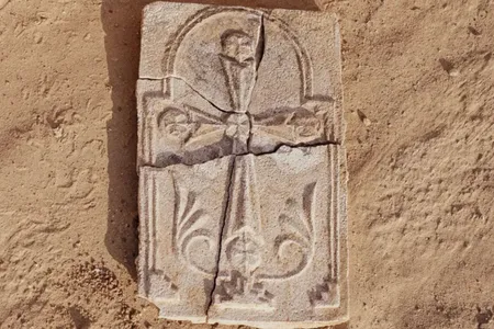 The plaster artifact is about one foot long, seven inches wide and one inch thick.