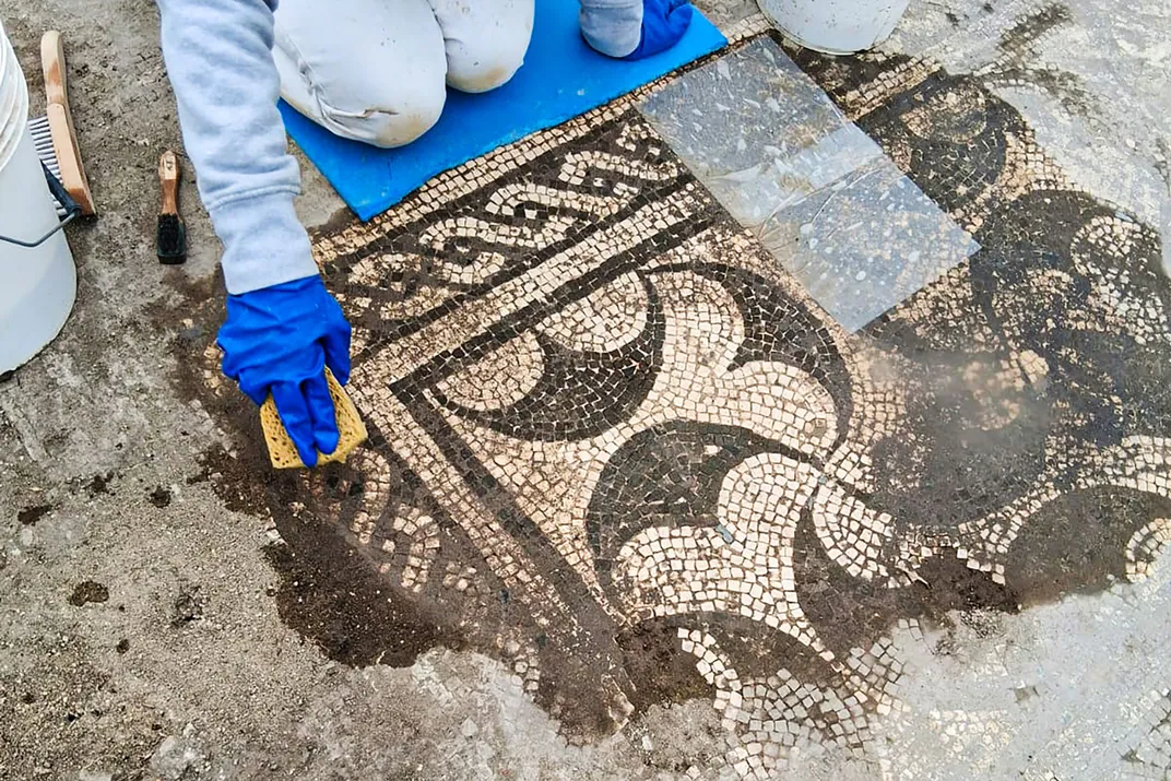 A black-and-white mosaic at the villa
