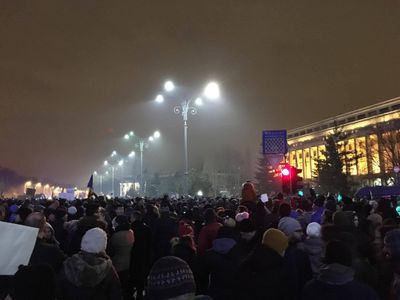 Romanians protest in Victoria Place in Bucharest on January 22.