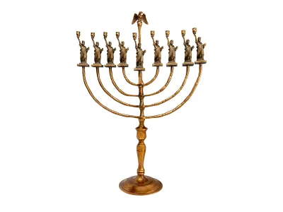 Many immigrants sought to preserve their cultural heritage while at the same time embracing their new identity as Americans. Manfred Anson did so in designing this Hanukkah lamp to mark the centennial of the Statue of Liberty in 1986.&nbsp;