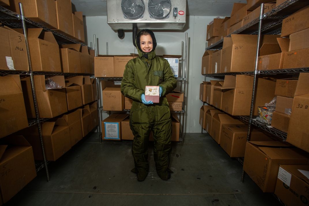 Jenna Pastel, research assistant for the Smithsonian's National Zoo's nutrition laboratory, stands inside a freezer stocked with samples of exotic animal milks. The freezer holds the largest animal milk repository in the world.