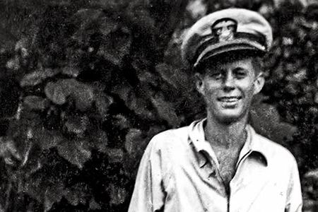 John F. Kennedy, with cane in the Pacific, 1943, would later downplay his PT-109 role: "It was involuntary," he quipped. "They sank my boat."