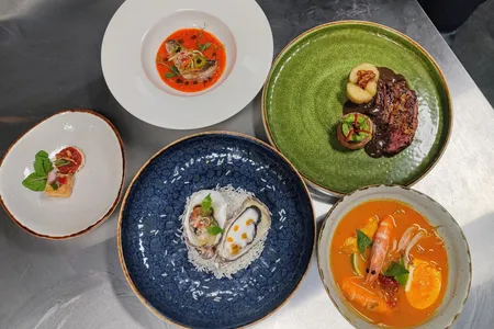 At Nona Manis, dining guests can enjoy a prix-fixe menu that may include any of these dishes: ikan pindang patin (braised fish), steak semur (steak with kecap manis sauce), laksa (seafood curry soup), oyster sambal matah and oyster gulai Aceh (oyster on the half shell with Balinese sambal and Aceh curry).