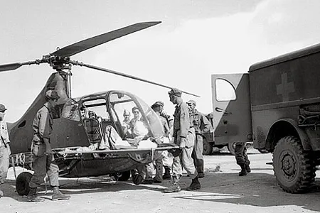 For the wounded on Luzon in 1945, the Sikorsky R-6A transport doubled as an ambulance.