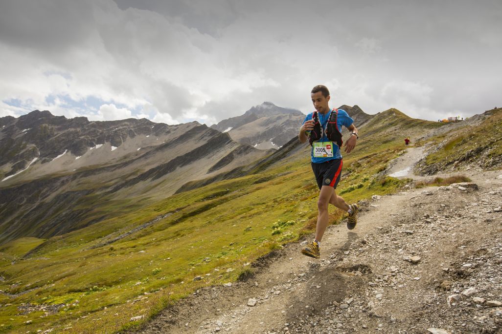 Person runs on a mountain
