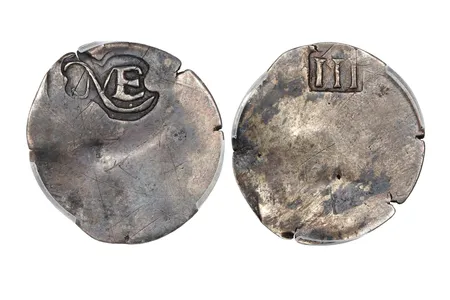 One side of the coin is stamped with a simple "NE" to represent New England, while the other side features Roman numerals to denote its value.