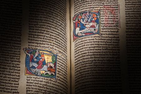 The illuminated manuscript's illustrations contain precious metals.