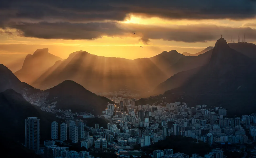 Christ the Redeemer statue hail the setting sun