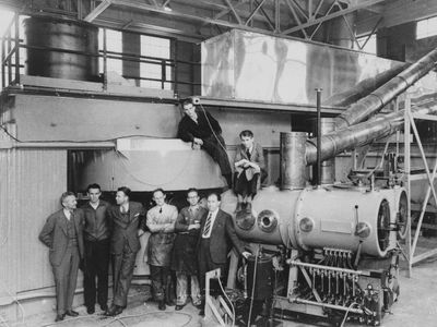 This photo shows the Berkeley 60-inch cyclotron, build in 1939. The year before, technetium-99 was discovered by Emilio Segrè and Glenn Seaborg using the facility's 37-inch cyclotron. Ernest Lawrence, the cyclotron's inventor, is standing, third from left.
