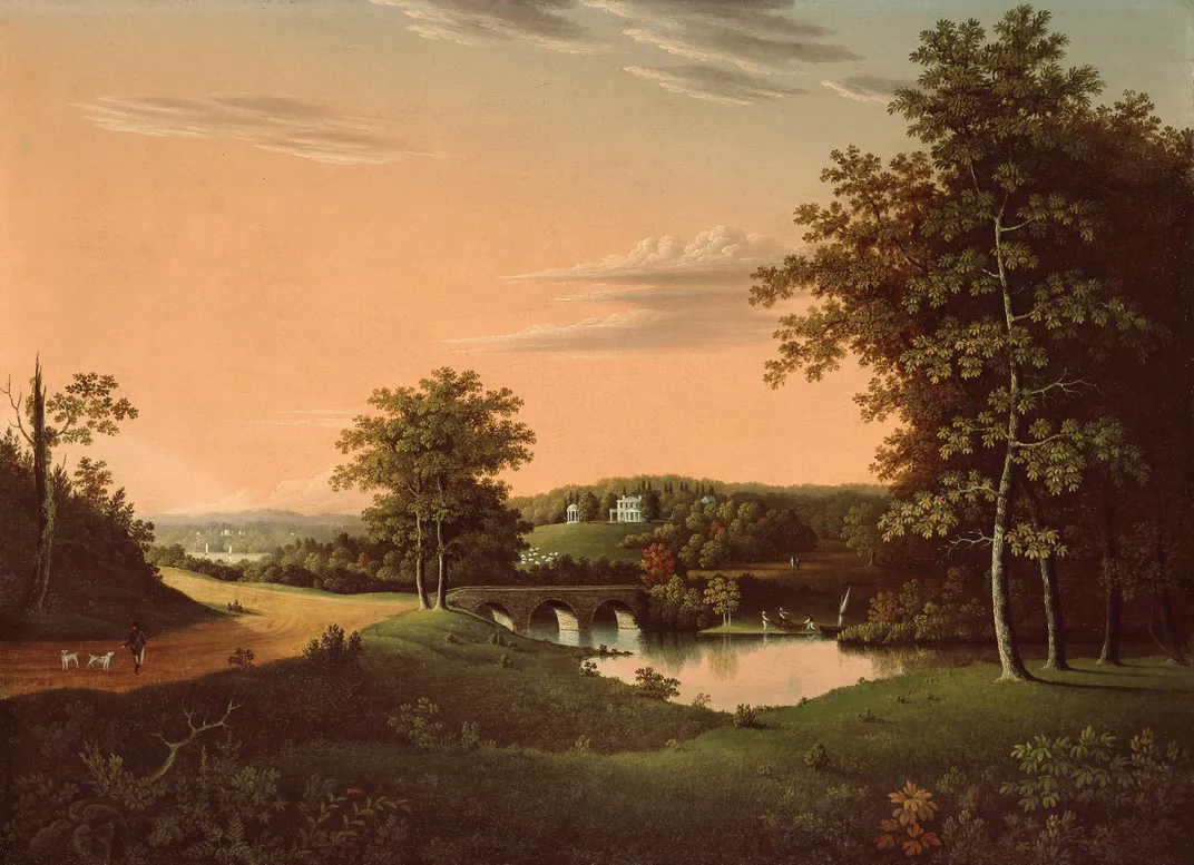 A sweeping vista with warm orange sunset light, rolling green hills and lush trees, a reflective pool of water and white classical house tucked in behind hills in the distance