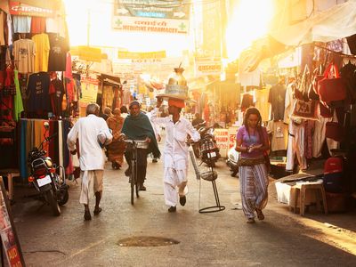 A computer that passes the new test would be able to say which people in this scene from Pushkar, India, are carrying objects and which are riding bikes