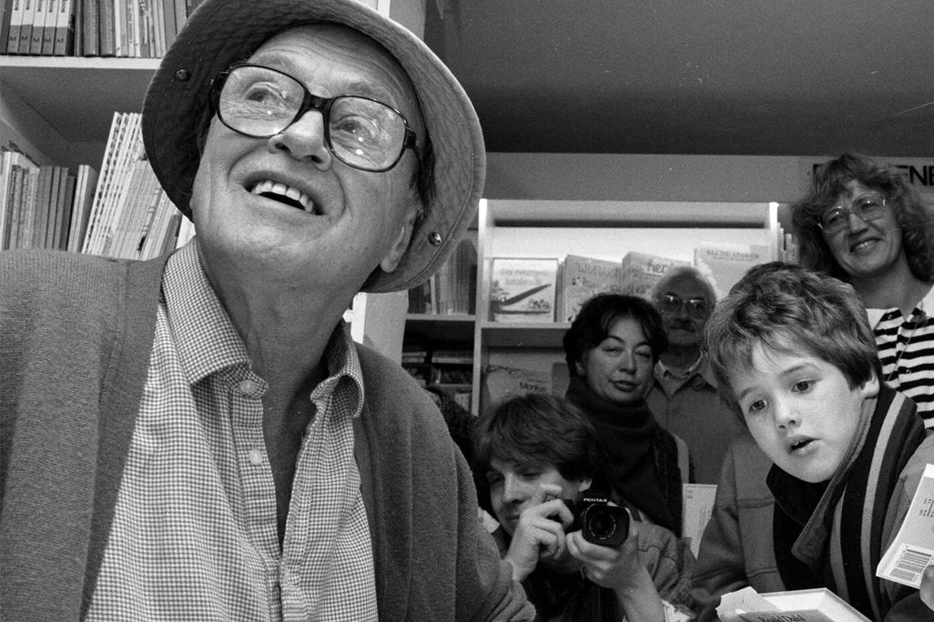 Roald Dahl signs books at a children's bookstore in Amsterdam in 1988