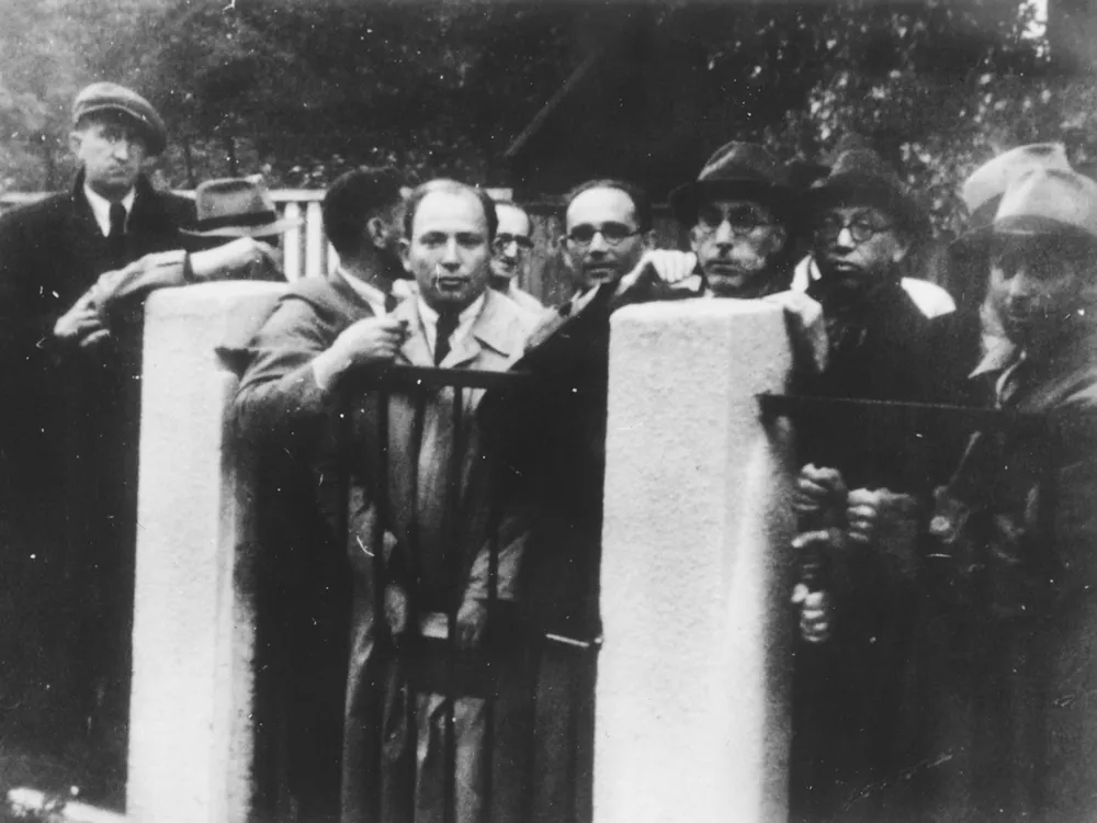 Jewish refugees lined up outside of the Japanese Consulate in Kaunas, Lithuania, waiting to receive transit visas from Chiune Sugihara in July 1940