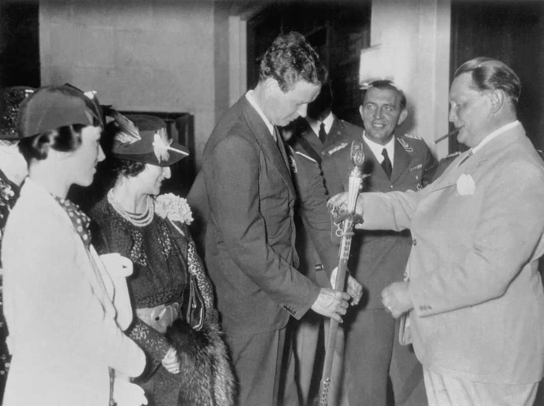 Leading Nazi Hermann Göring awards aviator Charles Lindbergh a medal in 1938.