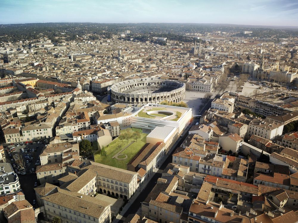 An aerial photograph shows the new museum’s proximity to the ancient arena.