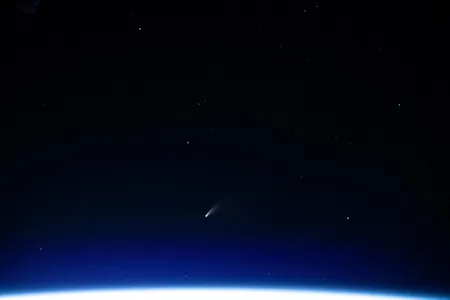 Like the newly-identified 2014 UN271, the NEOWISE comet pictured here is a long-period comet originating in the Oort Cloud. 