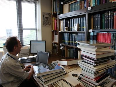 Research Associate Alain Touwaide, seated in his office in the Natural History Museum, argues Rome’s great expansion was driven not by geopolitical strategy, but by a need for plants.