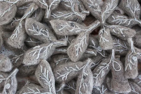 Small lungs made out of felt, infused with the DNA from killed Mycobacterium tuberculosis bacteria.