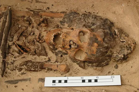 In 2010, researchers excavating this young woman's grave discovered a waxy cone atop her head.