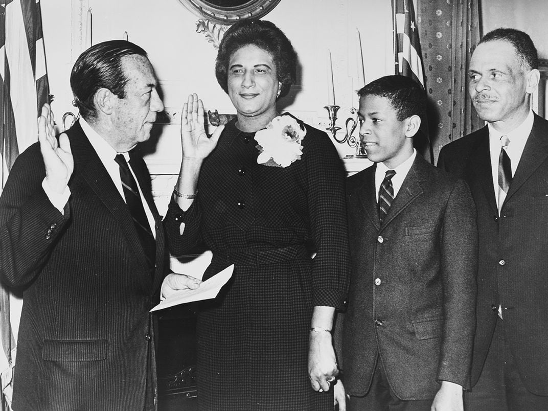 Motley with her family is sworn in as Manhattan borough president.