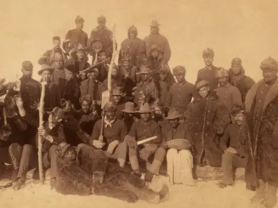 Buffalo soldiers of the 25th Infantry, some wearing buffalo robes, Ft. Keogh, Montana