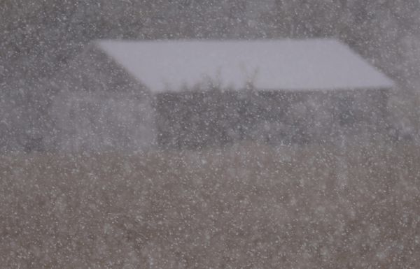 Snowfalling over a barn thumbnail
