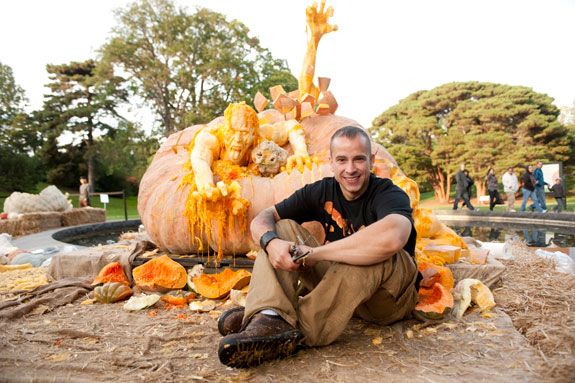 Ray Villafane and one of his pumpkin sculptures from 2011.