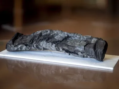 One of the&nbsp;scrolls carbonized by the eruption of Mount Vesuvius