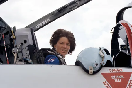 Sally Ride sitting in the cockpit of a NASA Northrop T-38 Talon training jet at Johnson Space Center, Houston, Texas, 1984


