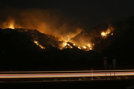 The Bighorn Fire burns through the western side of the Santa Catalina Mountains in Oro Valley, Arizona on June 14.