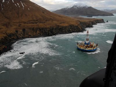 In a photo taken on January 3, 2012, Royal Dutch Shell's Kulluk drilling rig sits grounded off the Alaskan coast. 