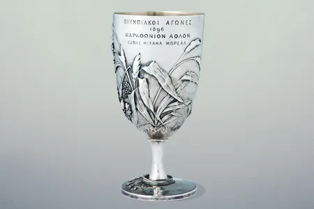 The Br&eacute;al Cup, designed by French scholar Michel Br&eacute;al, was awarded to the winner of the first Olympic marathon.