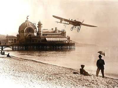 Bleriot XI-2 over a beach