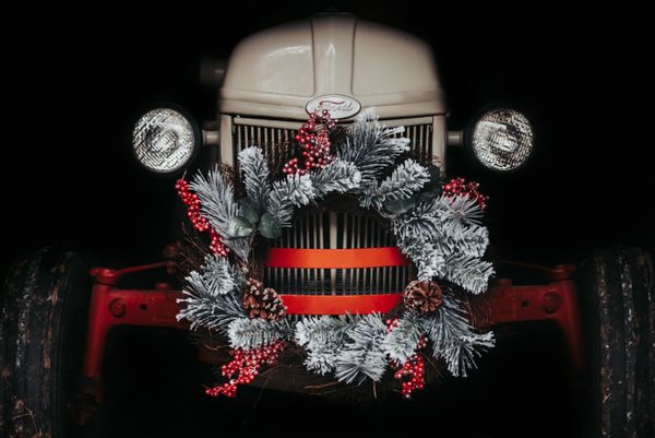 A festive antique Ford tractor thumbnail