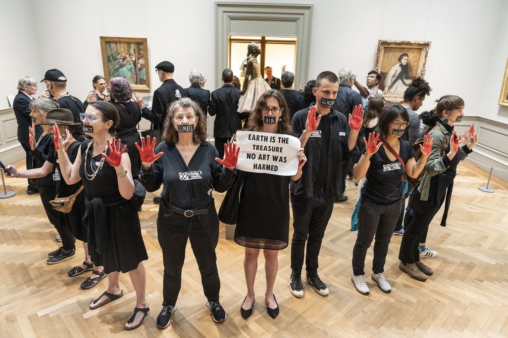 Protesters stand in a circle