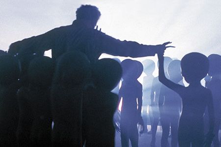 Movies, such as Close Encounters of the Third Kind, and conspiracy theorists insist we are not alone.