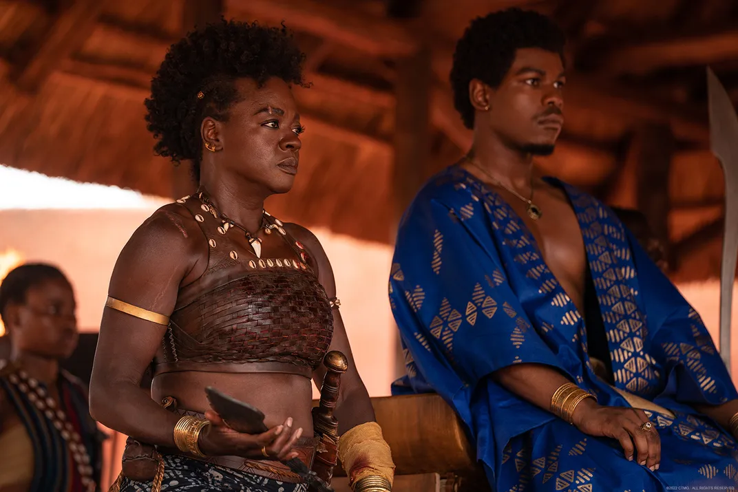 Viola Davis (left) as Nanisca and John Boyega (right) as King Ghezo