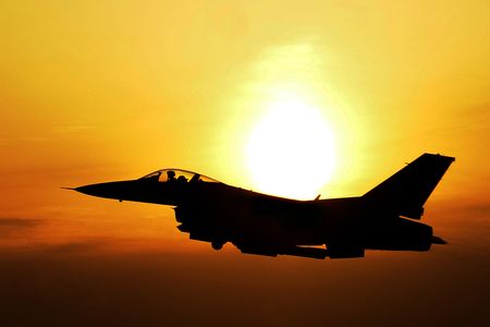 Into the sunset? An F-16 Fighting Falcon flies over South Korea during an operational readiness exercise in 2012. 
