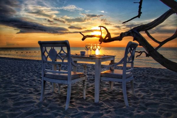 Dinner for two table at sunset thumbnail