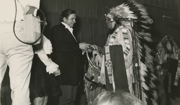 Cash receives an honor from a tribal elder.jpg