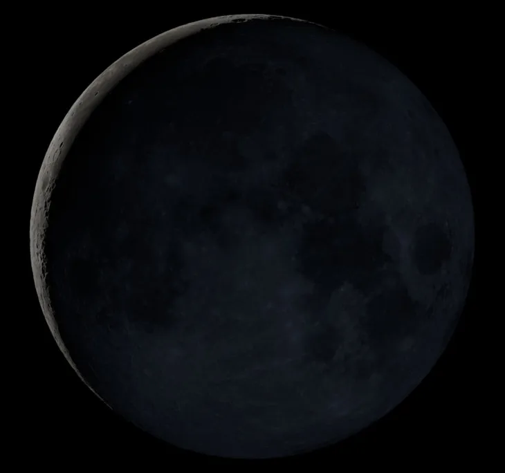 An image of a waning crescent moon as it appeared on April 28, 2022. It appears as a small sliver.