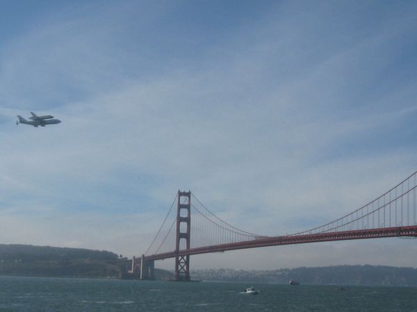 The Shuttle Endeavour's last flight as it circles the Golden Gate Bridge. thumbnail