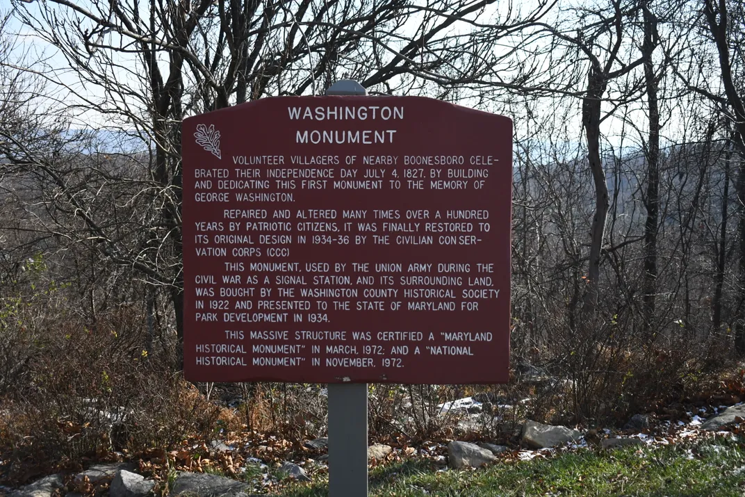 Sign detailing the monument's history